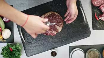 Rubbing Steak with Olive Oil-24288963